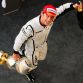 SAKHIR, BAHRAIN - APRIL 26:  Jenson Button of Great Britain and Brawn GP celebrates on the podium after winning the Bahrain Formula One Grand Prix at the Bahrain International Circuit on April 26, 2009 in Sakhir, Bahrain.  (Photo by Mark Thompson/Getty Images) *** Local Caption *** Jenson Button