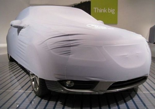 2010 Saab 9-5 with car cover