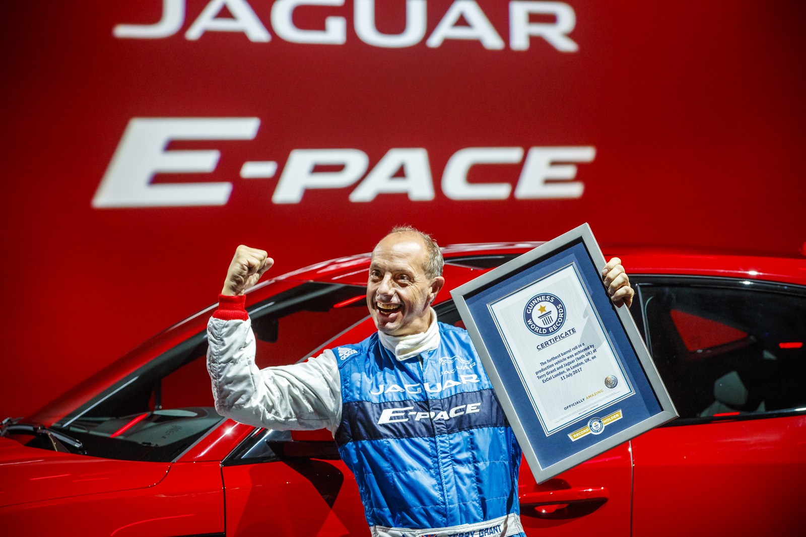 NOTE: IMAGE STRICTLY EMBARGOED UNTIL 20.00 BST, JULY 13th 2017. NO ON-LINE USE PRIOR TO THIS TIME.Jaguar stunt driver Terry Grant celebrates after setting a new Guinness World Record for longest barrel roll at the global launch of the new Jaguar E-PACE at ExCel London.