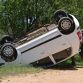 African Elephant Overturns and Punctures Small Car