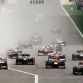 SAKHIR, BAHRAIN - APRIL 22:  Sebastian Vettel (right) of Germany and Red Bull Racing leads the field to the first corner at the start of the Bahrain Formula One Grand Prix at the Bahrain International Circuit on April 22, 2012 in Sakhir, Bahrain.  (Photo by Paul Gilham/Getty Images)