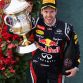 SAKHIR, BAHRAIN - APRIL 22:  Sebastian Vettel of Germany and Red Bull Racing celebrates on the podium after winning the Bahrain Formula One Grand Prix at the Bahrain International Circuit on April 22, 2012 in Sakhir, Bahrain.  (Photo by Mark Thompson/Getty Images)