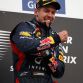 SAKHIR, BAHRAIN - APRIL 22:  Sebastian Vettel of Germany and Red Bull Racing celebrates on the podium after winning the Bahrain Formula One Grand Prix at the Bahrain International Circuit on April 22, 2012 in Sakhir, Bahrain.  (Photo by Clive Mason/Getty Images)
