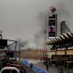 SAKHIR, BAHRAIN - APRIL 22:  Smoke is seen on the horizon during the Bahrain Formula One Grand Prix at the Bahrain International Circuit on April 22, 2012 in Sakhir, Bahrain.  (Photo by Paul Gilham/Getty Images)