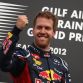 SAKHIR, BAHRAIN - APRIL 22:  Sebastian Vettel of Germany and Red Bull Racing celebrates on the podium after winning the Bahrain Formula One Grand Prix at the Bahrain International Circuit on April 22, 2012 in Sakhir, Bahrain.  (Photo by Clive Mason/Getty Images)