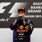 SAKHIR, BAHRAIN - APRIL 22:  Sebastian Vettel of Germany and Red Bull Racing celebrates on the podium after winning the Bahrain Formula One Grand Prix at the Bahrain International Circuit on April 22, 2012 in Sakhir, Bahrain.  (Photo by Paul Gilham/Getty Images)