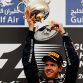 SAKHIR, BAHRAIN - APRIL 22:  Sebastian Vettel of Germany and Red Bull Racing celebrates on the podium after winning the Bahrain Formula One Grand Prix at the Bahrain International Circuit on April 22, 2012 in Sakhir, Bahrain.  (Photo by Paul Gilham/Getty Images)