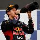 SAKHIR, BAHRAIN - APRIL 22:  Sebastian Vettel of Germany and Red Bull Racing celebrates on the podium after winning the Bahrain Formula One Grand Prix at the Bahrain International Circuit on April 22, 2012 in Sakhir, Bahrain.  (Photo by Paul Gilham/Getty Images)