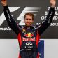 SAKHIR, BAHRAIN - APRIL 22:  Sebastian Vettel of Germany and Red Bull Racing celebrates on the podium after winning the Bahrain Formula One Grand Prix at the Bahrain International Circuit on April 22, 2012 in Sakhir, Bahrain.  (Photo by Paul Gilham/Getty Images)
