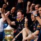 SAKHIR, BAHRAIN - APRIL 22:  Sebastian Vettel (2nd right) of Germany and Red Bull Racing celebrates with team mate Mark Webber (right) of Australia and Red Bull Racing, Red Bull Racing Team Principal Christian Horner (2nd left) and Red Bull Racing Motorsport Consultant Dr Helmut Marko (L) in the paddock after winning the Bahrain Formula One Grand Prix at the Bahrain International Circuit on April 22, 2012 in Sakhir, Bahrain.  (Photo by Paul Gilham/Getty Images)