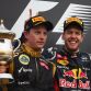 SAKHIR, BAHRAIN - APRIL 22:  Race winner Sebastian Vettel (R) of Germany and Red Bull Racing celebrates on the podium with second placed Kimi Raikkonen (L) of Finland and Lotus following the Bahrain Formula One Grand Prix at the Bahrain International Circuit on April 22, 2012 in Sakhir, Bahrain.  (Photo by Clive Mason/Getty Images)