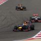SAKHIR, BAHRAIN - APRIL 22:  Sebastian Vettel of Germany and Red Bull Racing drives ahead of Lewis Hamilton of Great Britain and McLaren and Mark Webber of Australia and Red Bull Racing during the Bahrain Formula One Grand Prix at the Bahrain International Circuit on April 22, 2012 in Sakhir, Bahrain.  (Photo by Clive Mason/Getty Images)