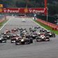 SPA FRANCORCHAMPS, BELGIUM - AUGUST 28:  Sebastian Vettel (C) of Germany and Red Bull Racing leads the field towards the first corner at the start of the Belgian Formula One Grand Prix at the Circuit of Spa Francorchamps on August 28, 2011 in Spa Francorchamps, Belgium.  (Photo by Mark Thompson/Getty Images)