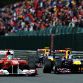 SPA FRANCORCHAMPS, BELGIUM - AUGUST 28:  Fernando Alonso (L) of Spain and Ferrari and Sebastian Vettel (R) of Germany and Red Bull Racing drive side by side during the Belgian Formula One Grand Prix at the Circuit of Spa Francorchamps on August 28, 2011 in Spa Francorchamps, Belgium.  (Photo by Lars Baron/Getty Images)