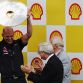 SPA FRANCORCHAMPS, BELGIUM - AUGUST 28:  Red Bull Racing Chief Technical Officer Adrian Newey (L) is presented with the Constructors Trophy by Shell CEO Peter Voser (R) on the podium after the Belgian Formula One Grand Prix at the Circuit of Spa Francorchamps on August 28, 2011 in Spa Francorchamps, Belgium.  (Photo by Vladimir Rys/Getty Images)