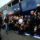 SPA FRANCORCHAMPS, BELGIUM - AUGUST 28:  Race winner Sebastian Vettel (L) of Germany and Red Bull Racing and third placed team mate Mark Webber (R) of Australia and Red Bull Racing celebrate with team mates after the Belgian Formula One Grand Prix at the Circuit of Spa Francorchamps on August 28, 2011 in Spa Francorchamps, Belgium.  (Photo by Lars Baron/Getty Images)