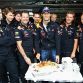 SPA FRANCORCHAMPS, BELGIUM - AUGUST 27:  Mark Webber (C) of Australia and Red Bull Racing is presented with a cake by his team mates to celebrate his 35th birthday before qualifying for the Belgian Formula One Grand Prix at the Circuit of Spa Francorchamps on August 27, 2011 in Spa Francorchamps, Belgium.  (Photo by Mark Thompson/Getty Images)
