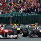 SPA FRANCORCHAMPS, BELGIUM - AUGUST 28:  Fernando Alonso (L) of Spain and Ferrari and Sebastian Vettel (R) of Germany and Red Bull Racing drive side by side during the Belgian Formula One Grand Prix at the Circuit of Spa Francorchamps on August 28, 2011 in Spa Francorchamps, Belgium.  (Photo by Lars Baron/Getty Images)