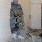 bmw-x5-launches-through-wall.jpg