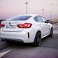 bmw_x6m_by_ac_schnitzer_fahrend_hinten_300