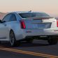 The Cadillac ATS-V Coupe arrives track-capable from the factory next spring, powered by the first-ever twin-turbocharged engine in a V-Series. Rated at an estimated 455 horsepower (339 kW) and 445 lb-ft of torque (603 Nm), the 3.6L V-6 is the segmentâs highest-output six-cylinder and enables 0-60 performance of less than 4 seconds and a top speed of more than 185 mph.
