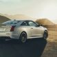 The Cadillac ATS-V Coupe arrives track-capable from the factory next spring, powered by the first-ever twin-turbocharged engine in a V-Series. Rated at an estimated 455 horsepower (339 kW) and 445 lb-ft of torque (603 Nm), the 3.6L V-6 is the segmentâs highest-output six-cylinder and enables 0-60 performance of less than 4 seconds and a top speed of more than 185 mph.