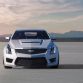 The Cadillac ATS-V Coupe arrives track-capable from the factory next spring, powered by the first-ever twin-turbocharged engine in a V-Series. Rated at an estimated 455 horsepower (339 kW) and 445 lb-ft of torque (603 Nm), the 3.6L V-6 is the segmentâs highest-output six-cylinder and enables 0-60 performance of less than 4 seconds and a top speed of more than 185 mph.