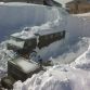 Cars buried in snow