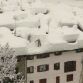 Cars buried in snow