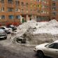 Cars buried in snow