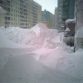 Cars buried in snow