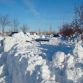 Cars buried in snow