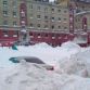 Cars buried in snow