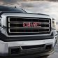 2014 GMC Sierra SLT Crew Cab in Iridium Metallic front end detail - on location