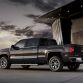 2014 GMC Sierra SLT Crew Cab in Iridium Metallic left rear three quarter shot- on location