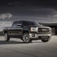 2014 GMC Sierra SLT Crew Cab Front Three Quarter in Iridium Metallic - on location