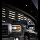 2014 GMC Sierra SLT Crew Cab in Iridium Metallic headlamp detail - on location