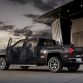 2014 GMC Sierra SLT Crew Cab in Iridium Metallic left rear three quarter shot doors open- on location