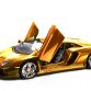 Gold Lamborghini Aventador Miniature by Robert Guelpen