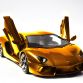 Gold Lamborghini Aventador Miniature by Robert Guelpen