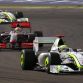Brawn GP's British driver Jenson Button drives ahead McLaren Mercedes' British driver Lewis Hamilton and Brawn GP's Brazilian driver Rubens Barrichello during the Bahrain Formula One Grand Prix at the Sakhir racetrack, on April 26, 2009 in Manama.            AFP PHOTO / KARIM SAHIB (Photo credit should read KARIM SAHIB/AFP/Getty Images)