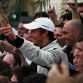 SAKHIR, BAHRAIN - APRIL 26:  Jenson Button of Great Britain and Brawn GP celebrates with team mates in the paddock after winning the Bahrain Formula One Grand Prix at the Bahrain International Circuit on April 26, 2009 in Sakhir, Bahrain.  (Photo by Vladimir Rys/Bongarts/Getty Images) *** Local Caption *** Jenson Button