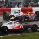 MONTREAL, CANADA - JUNE 12:  Lewis Hamilton (rear) of Great Britain and McLaren and team mate Jenson Button (front) of Great Britain and McLaren drive either side of Mark Webber (centre) of Australia and Red Bull Racing as he spins during the Canadian Formula One Grand Prix at the Circuit Gilles Villeneuve on June 12, 2011 in Montreal, Canada.  (Photo by Mark Thompson/Getty Images)