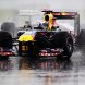 MONTREAL, CANADA - JUNE 12:  Sebastian Vettel of Germany and Red Bull Racing leads the field in the early stages of the Canadian Formula One Grand Prix at the Circuit Gilles Villeneuve on June 12, 2011 in Montreal, Canada.  (Photo by Paul Gilham/Getty Images)