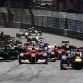 MONTE CARLO, MONACO - MAY 29:  Sebastian Vettel (R) of Germany and Red Bull Racing leads the field into the first corner at the start of the Monaco Formula One Grand Prix at the Monte Carlo Circuit on May 29, 2011 in Monte Carlo, Monaco.  (Photo by Mark Thompson/Getty Images)