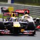 BUDAPEST, HUNGARY - JULY 31:  (L-R) Sebastian Vettel of Germany and Red Bull Racing and Lewis Hamilton of Great Britain and McLaren fight for the lead at the start of the Hungarian Formula One Grand Prix at the Hungaroring on July 31, 2011 in Budapest, Hungary.  (Photo by Mark Thompson/Getty Images)