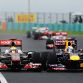 BUDAPEST, HUNGARY - JULY 31:  (L-R) Lewis Hamilton of Great Britain and McLaren and Sebastian Vettel of Germany and Red Bull Racing race side by side during the Hungarian Formula One Grand Prix at the Hungaroring on July 31, 2011 in Budapest, Hungary.  (Photo by Lars Baron/Getty Images)