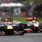 BUDAPEST, HUNGARY - JULY 31:  (L-R) Sebastian Vettel of Germany and Red Bull Racing and Lewis Hamilton of Great Britain and McLaren fight for the lead at the start of the Hungarian Formula One Grand Prix at the Hungaroring on July 31, 2011 in Budapest, Hungary.  (Photo by Mark Thompson/Getty Images)