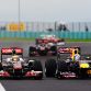 BUDAPEST, HUNGARY - JULY 31:  (L-R) Lewis Hamilton of Great Britain and McLaren and Sebastian Vettel of Germany and Red Bull Racing race side by side during the Hungarian Formula One Grand Prix at the Hungaroring on July 31, 2011 in Budapest, Hungary.  (Photo by Lars Baron/Getty Images)