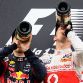 BUDAPEST, HUNGARY - JULY 31:  Race winner Jenson Button (R) of Great Britain and McLaren celebrates on the podium with second placed Sebastian Vettel (L) of Germany and Red Bull Racing following the Hungarian Formula One Grand Prix at the Hungaroring on July 31, 2011 in Budapest, Hungary.  (Photo by Mark Thompson/Getty Images)